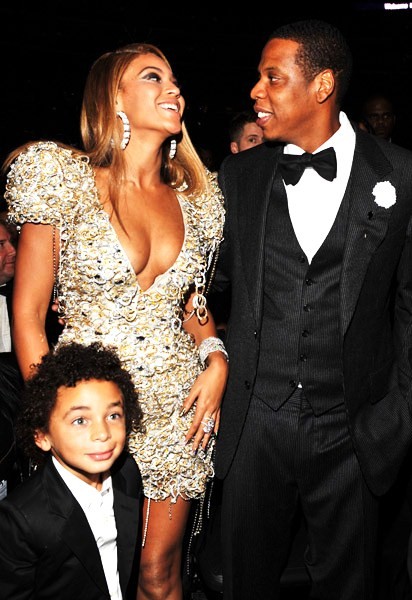 But when Beyonce was back he looked happy excited ADORE Beyonce's dress